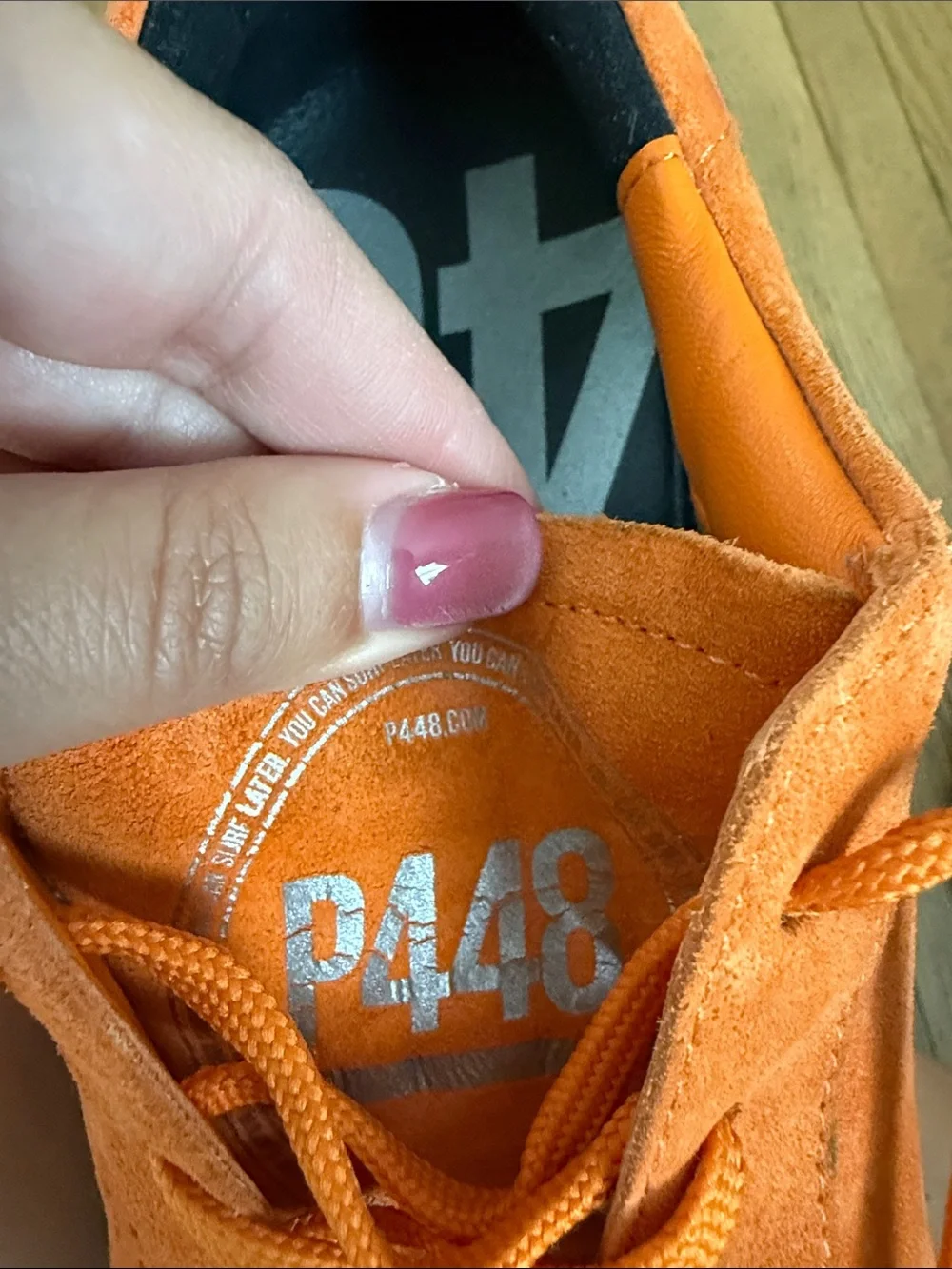 P448 Orange Suede Low-Top Sneakers